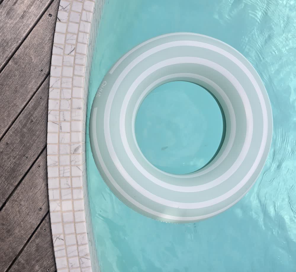 Bird’s-eye view of tiled pool, in wooden deck outdoor area